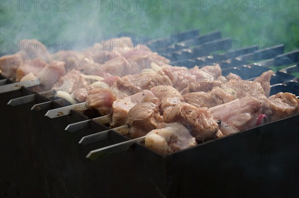 Process of cooking shashlik from pickled meat outdoor