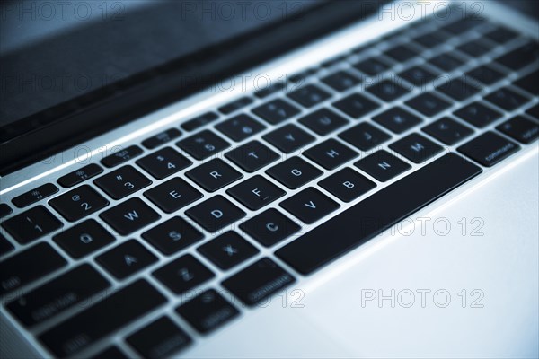 Grey laptop keyboard close up