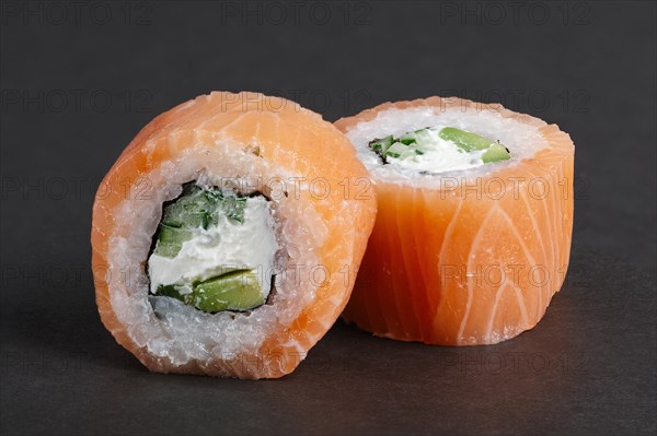 Salmon rolls with avocado and cucumber