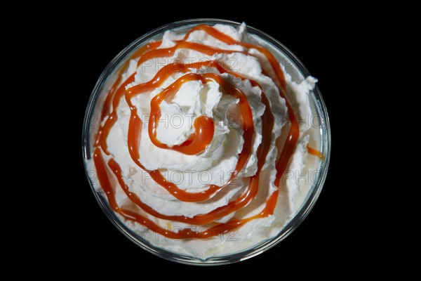 Top view of glass of smoothies isolated on black