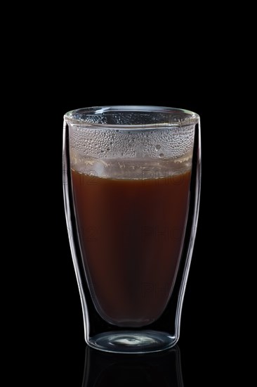 Double-walled glass with coffee isolated on black. Photo with clipping path