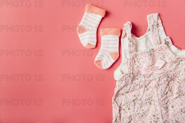Pair sock baby dress bright colored background