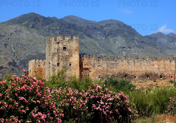 View of the fortress of Frangokastello on the southern coast of the Mediterranean island and the Kryoneritis mountains in the background