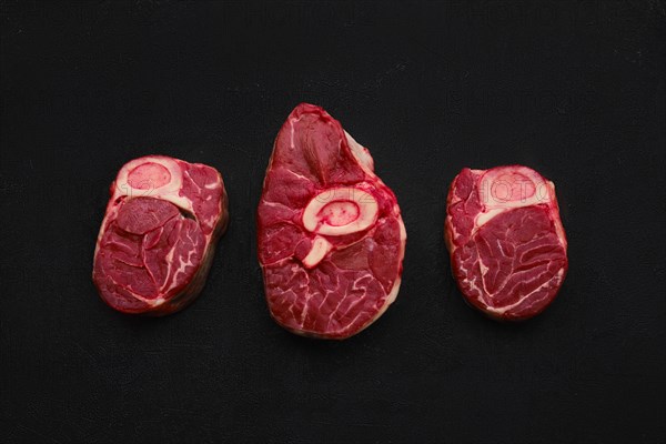 Overhead view of tree raw beef shank cross cut