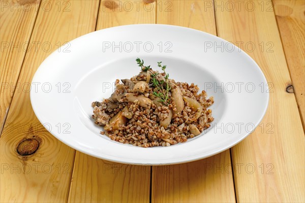 Boiled buckwheat with marinated mushroom