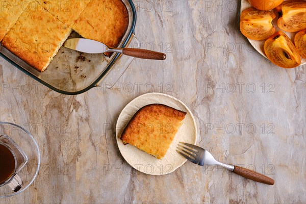 Persimmon pie on wooden table