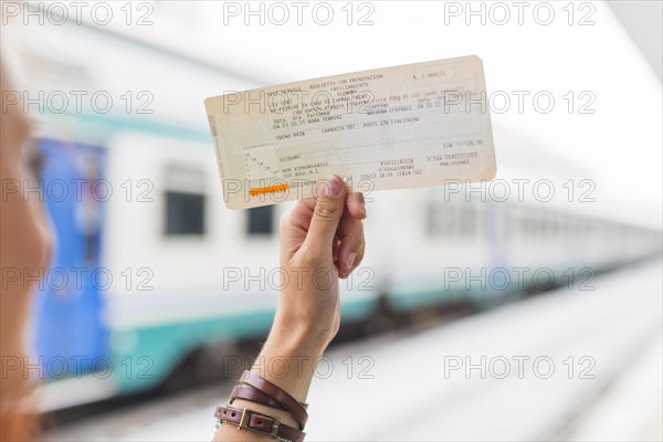 Female tourist waiting train