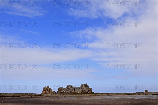 Country house between rocks near Le Gouffre