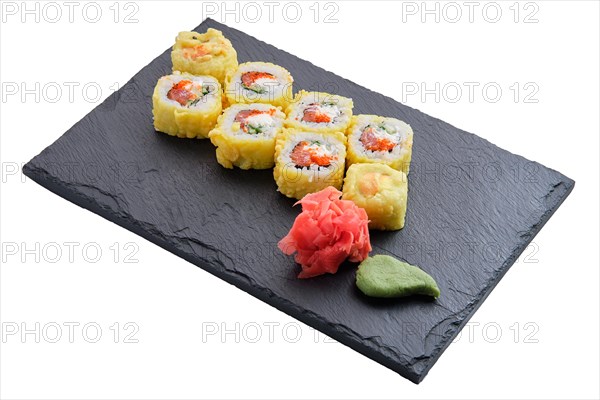 Bonito rolls with garnish isolated on white background