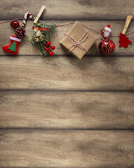 Christmas decorations hanging wooden background