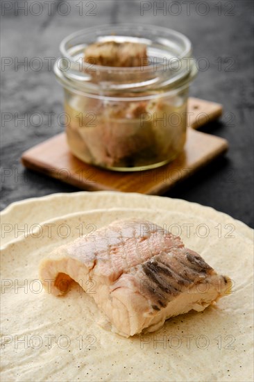 Closeup view of canned sturgeon on a plate