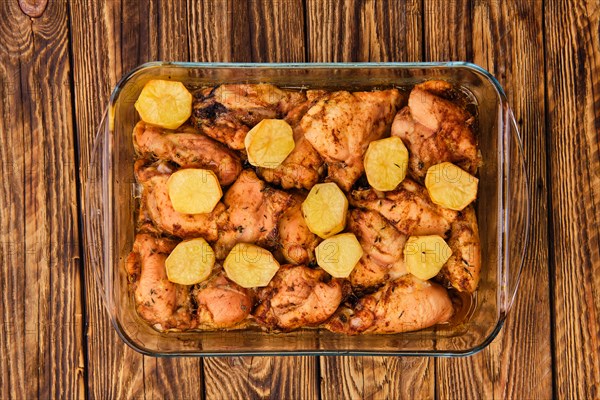 Top view of baked chicken and potato