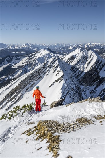 Ski tourers at the summit of Sonntagshorn