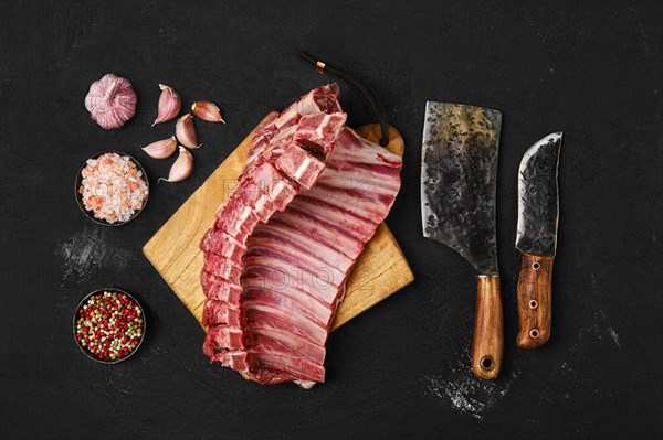 Top view of raw lamb ribs on the kitchen table