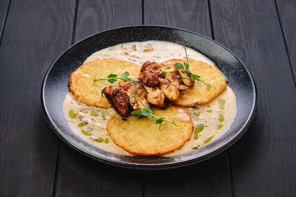 Potato fritters with teriyaki chicken fillet