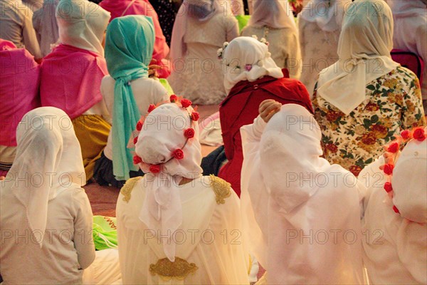 Small girls with hijab in a big mosque