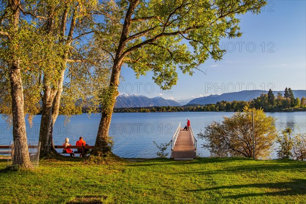 Jetty at Staffelsee with Ester Mountains in the evening sun