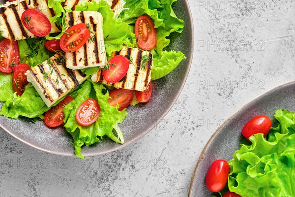 Top view of salad with grilled cheese