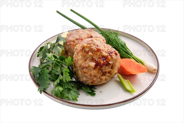 Meatballs served with fresh carrot