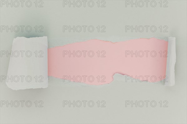 Pink white torn paper surface