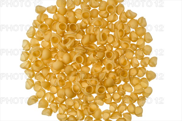 Overhead view of pipe rigate pasta isolated on white background
