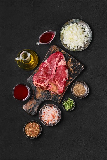 Preparation of Porterhouse steak in wine sauce