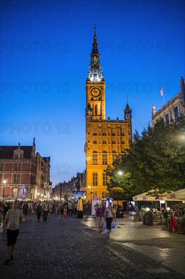 Hanseatic league houses with the town hall after sunset in the pedestrian zone of Gdansk. Poland