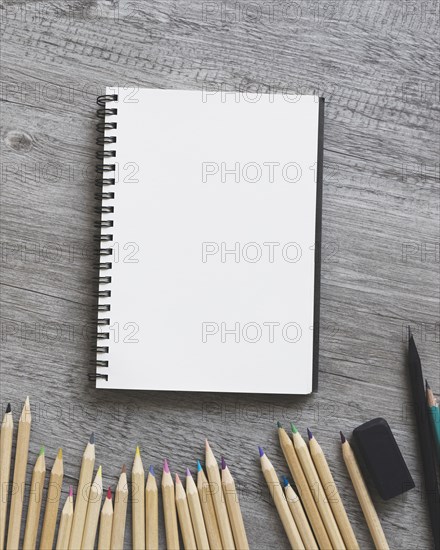 Close up pencils near sketchbook