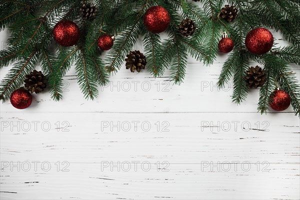 Fir branch with christmas baubles