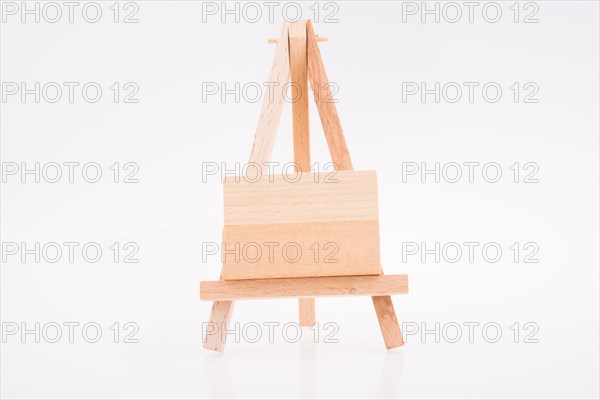 Building blocks put on tripod for painting on white background