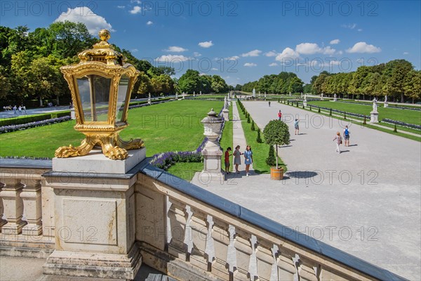 Staircase at the palace with view to the baroque garden parterre in the palace park