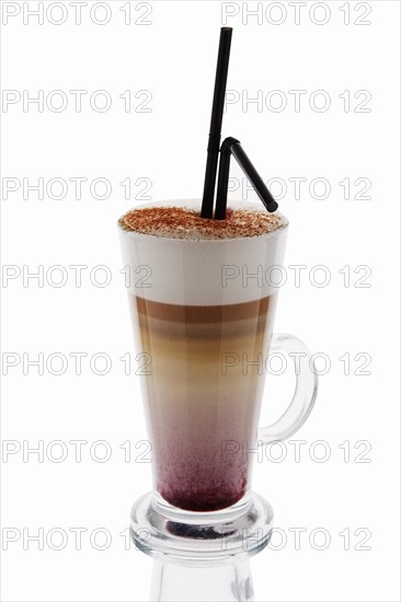 Blueberry cappuccino in tall glass isolated on white background