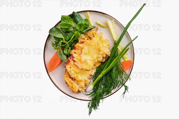 Chopped meat with tomato covered with melted cheese isolated on white background