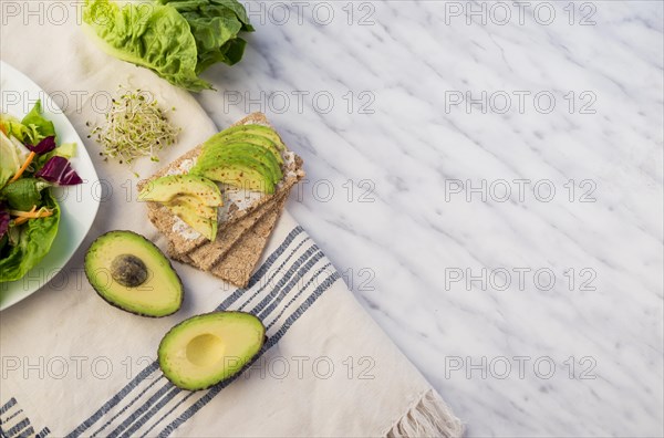 Crisp bread with avocado table