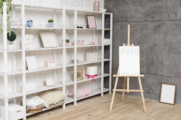 Modern bright bookshelf with decoration