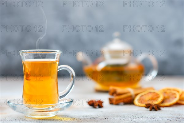 Hot citrus tea with cinnamon and anise