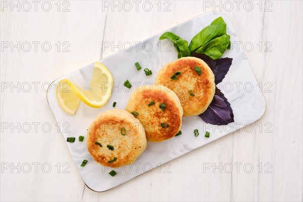 Top view of fried cod meat cutlet