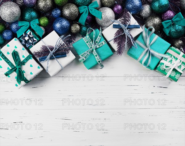 Christmas composition of gift boxes and colourful baubles