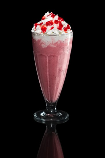 Milkshake strawberry summer cocktail isolated on black