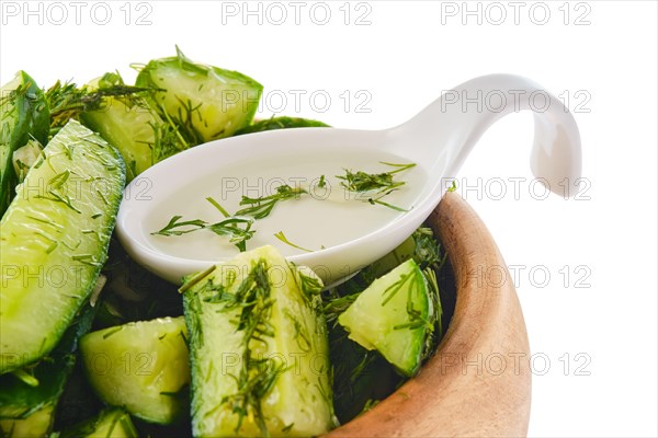 Closeup view of pickled cucumber with dill and garlic