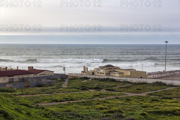 Restaurant and Muslim cemetery by the sea