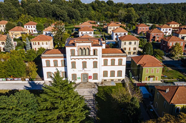 Aerial of the Unesco world heritage site "company town". Crespi dÂ´Adda