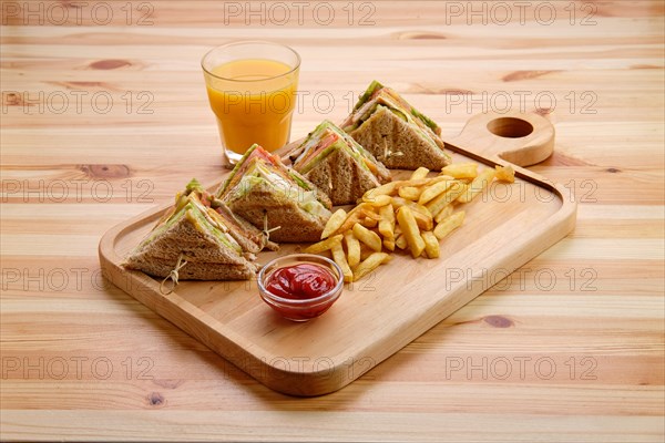 Club sandwich with american fries