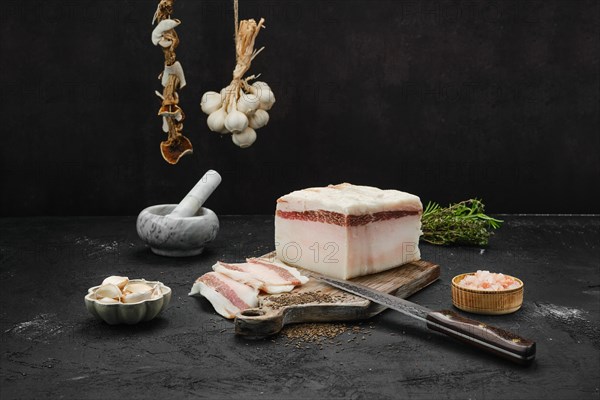 Salted pork belly lard on cutting board