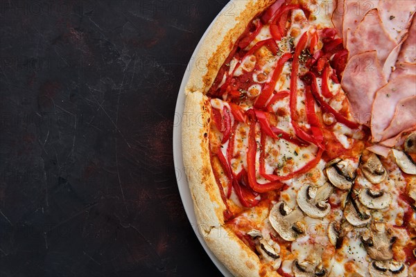 Close up view of pizza four seasons with mushrooms