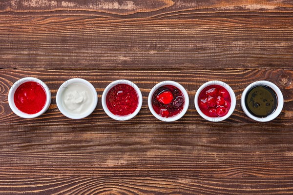 Overhead view of assortment of fruit puree. Jam