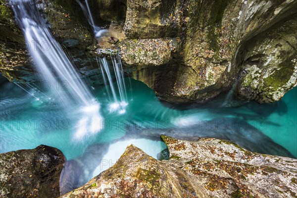 Mountain river Soca flows through narrow canyon