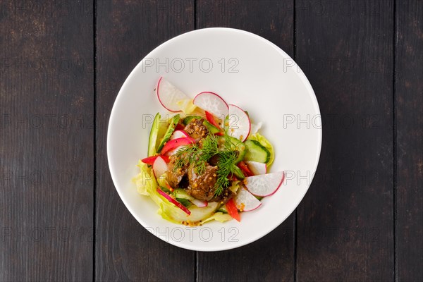 Top view of salad with beef liver