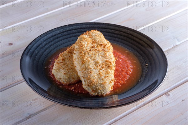 Cutlet in breading with adjika sauce