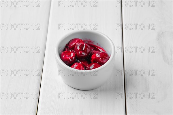 Cherry sauce in ceramic gravy boat